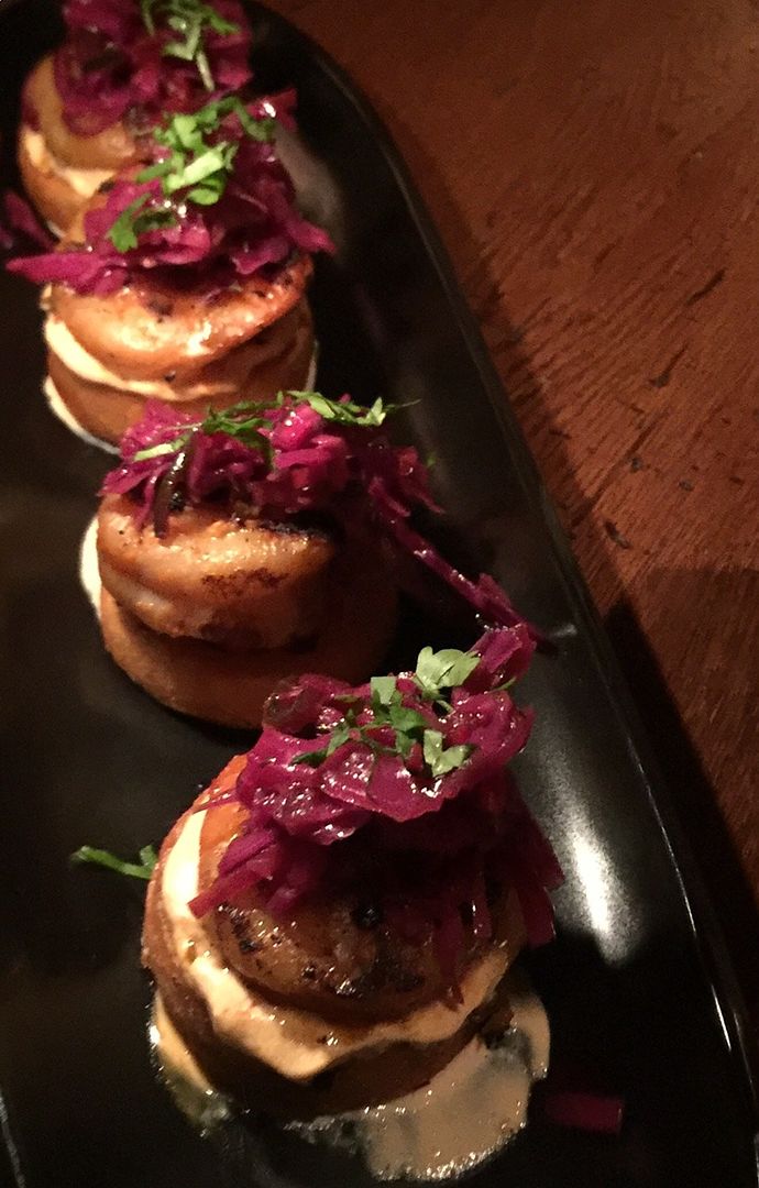 Street food notions from around the globe in miniature, like these delicious blackened shrimp arepas. 