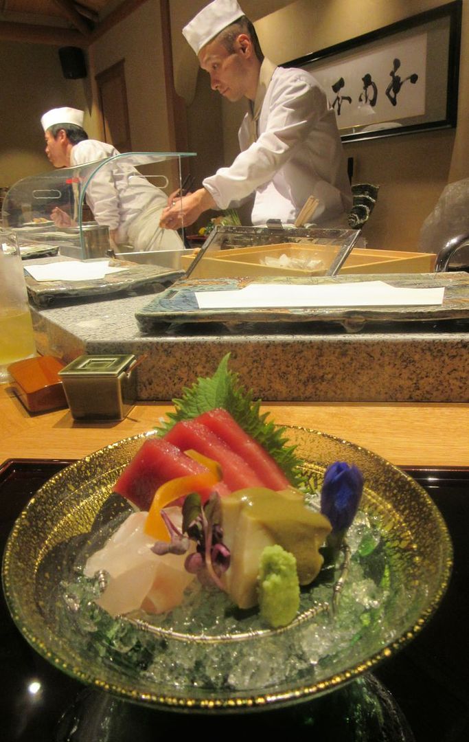 The master has mixed and tested the batter. Now his second takes over. We’re on the sashimi course.
